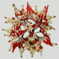 Дерево из красного и белого коралла в вазочке из оникса