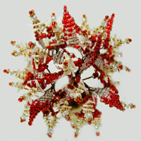 Дерево из красного и белого коралла в вазочке из оникса